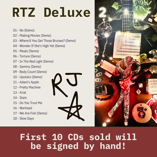 A promotional graphic for RTZ Deluxe 2, featuring a tracklist on the left, a collage of musical instruments and memorabilia on the right, and a maroon banner at the bottom stating 'First 10 CDs sold will be signed by hand!'.